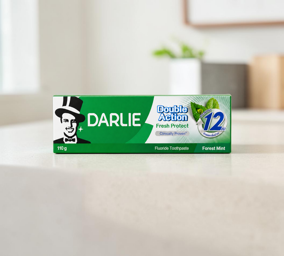 Thai Ranee Darlie Double Action Fresh Protect Forest Mint toothpaste box, 110g, featuring green branding and mint.