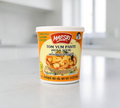 Thai Ranee Mae Sri Tom Yum hot and sour cooking paste in a 400g plastic tub with Thai soup serving suggestion