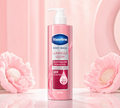 Thai Ranee Vaseline Luminous Glow GlutaGlow body wash in a pink 425ml pump bottle with floral accents