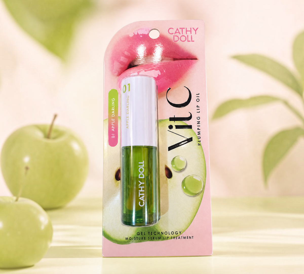 Thai Ranee Cathy Doll Vit C Plumping Lip Oil in 01 Apple Darling, a green-tinted moisturizing serum lip treatment.