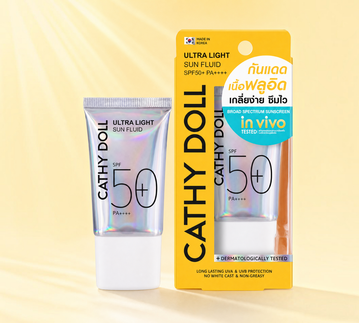 Thai Ranee Cathy Doll Ultra Light Sun Fluid SPF50+ PA++++ facial sunscreen in a holographic tube and yellow box.