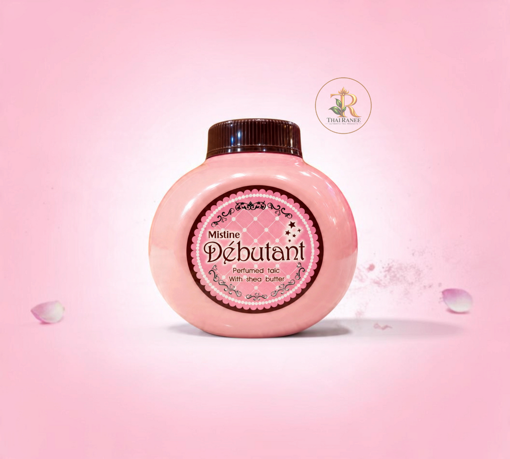 Thai Ranee Mistine Debutant perfumed talc in a round pink bottle with shea butter and fruity floral fragrance