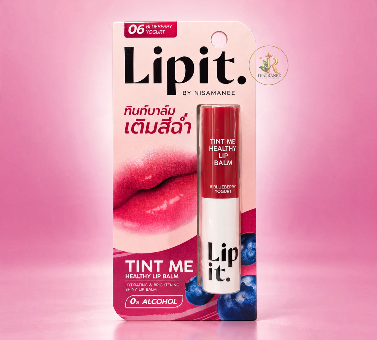 Thai Ranee Lipit. by Nisamanee Tint Me Healthy Lip Balm in #06 Blueberry Yogurt on pink background