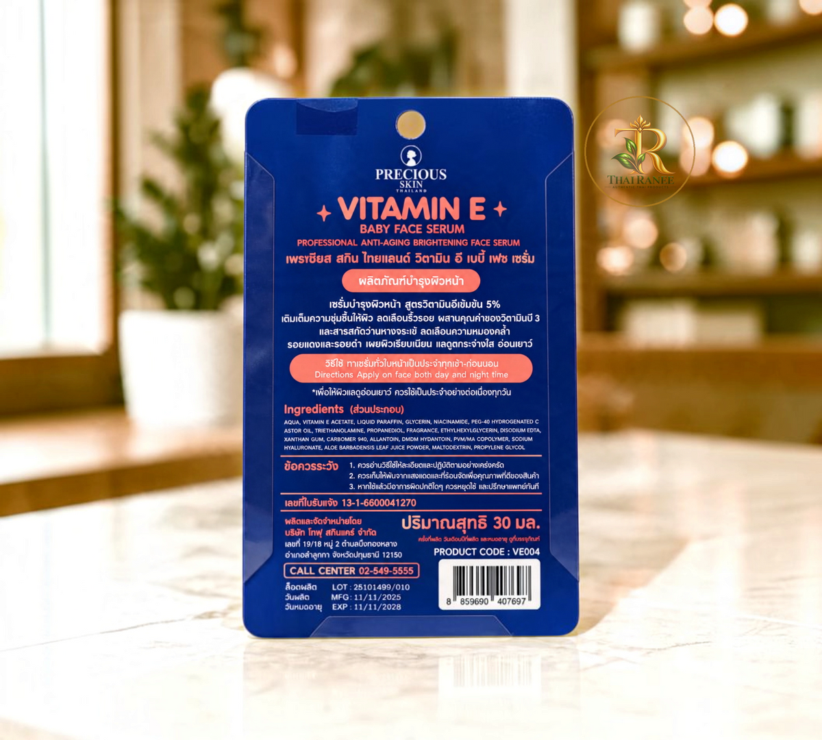 Thai Ranee Precious Skin Thailand Vitamin E Baby Face Serum 5% in a blue sachet for brightening and anti-aging care.
