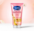 Thai Ranee Vaseline Healthy Bright Gluta-Hya Dewy Radiance serum burst lotion in a 290ml pink squeeze tube.