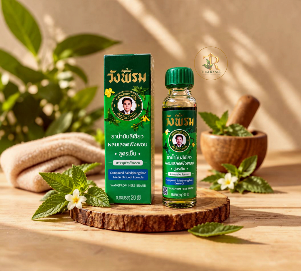 Thai Ranee Wangprom Herb Compound Saledphangphon green oil cool formula in a 20cc bottle with its green box packaging.