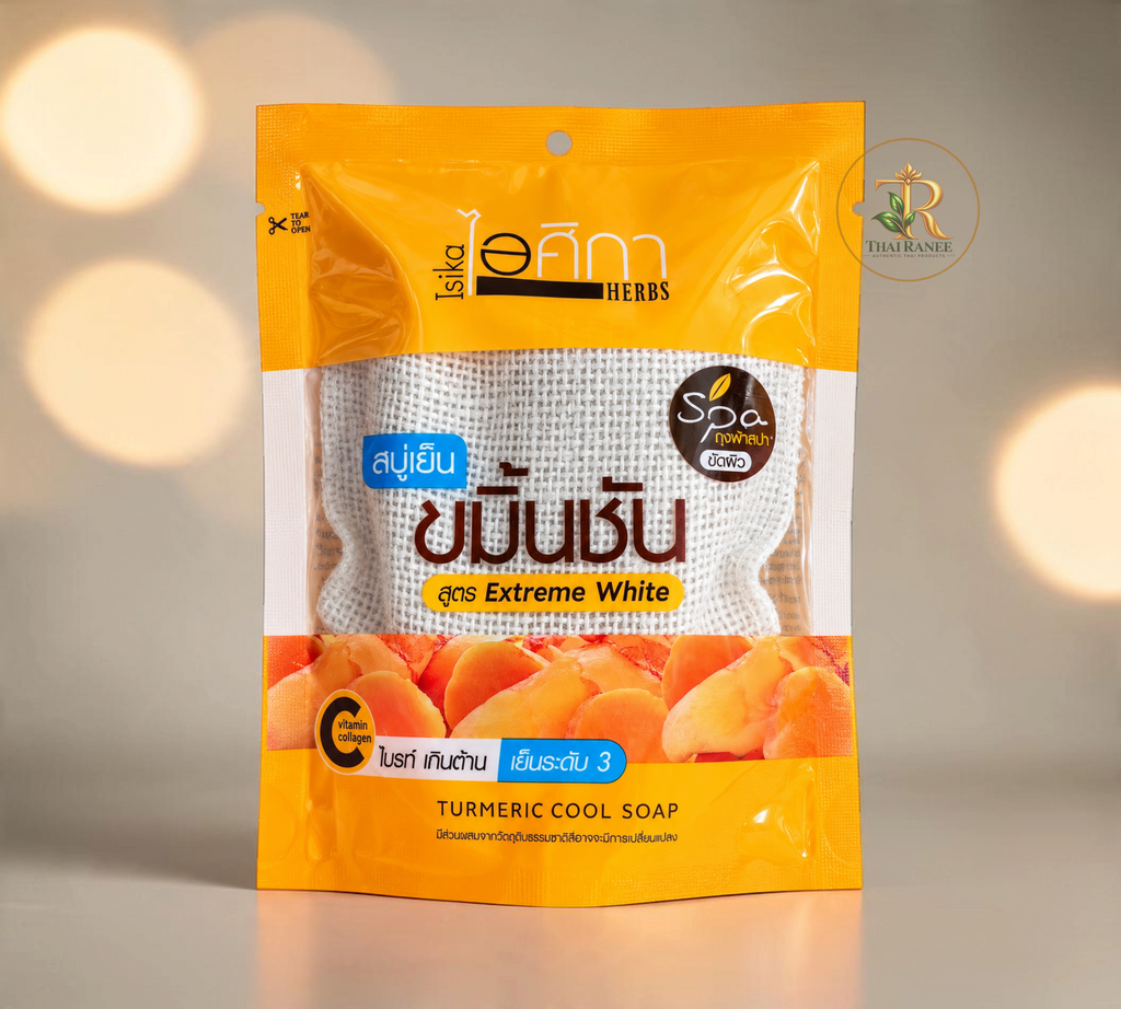 Thai Ranee Isika Herbs Turmeric Cool Soap Extreme White in a yellow pouch with a mesh exfoliating bag