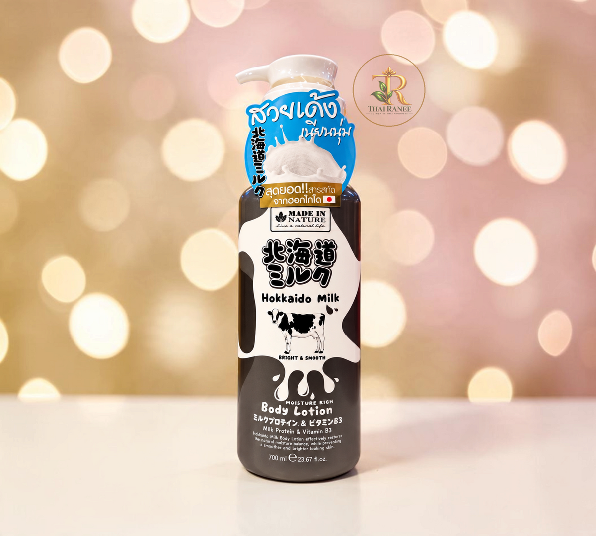 Thai Ranee Made in Nature Hokkaido Milk moisture-rich shower cream in a black bottle with cow print design