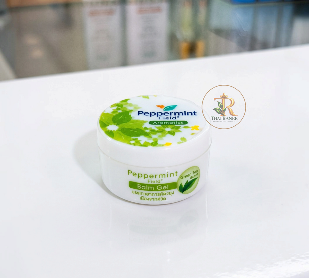 Thai Ranee Peppermint Field green tea scented aromatic balm gel in a small white 8g container for nasal relief
