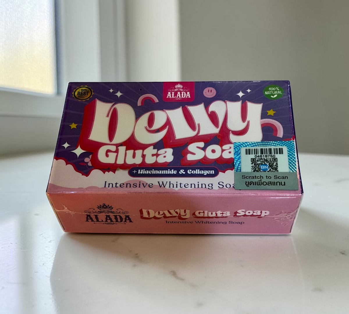 Thai Ranee ALADA Dewy Gluta Soap bar in purple and pink packaging with whitening, collagen, and niacinamide formula.