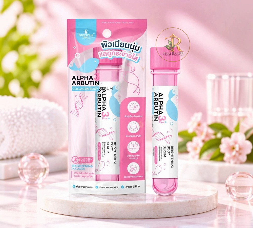 Thai Ranee Precious Skin Thailand Alpha Arbutin Collagen Body Serum in pink packaging on a marble pedestal.