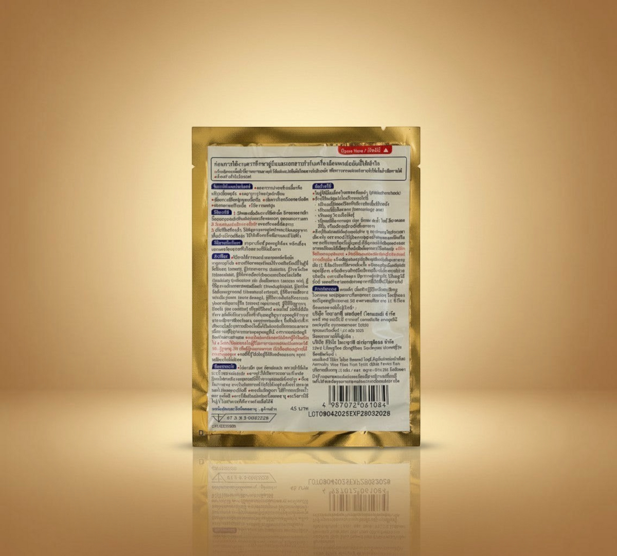 Thai Ranee Ammeltz Yoko Yoko Gold heat patch for period pain relief in a gold foil sachet with Thai instructions.