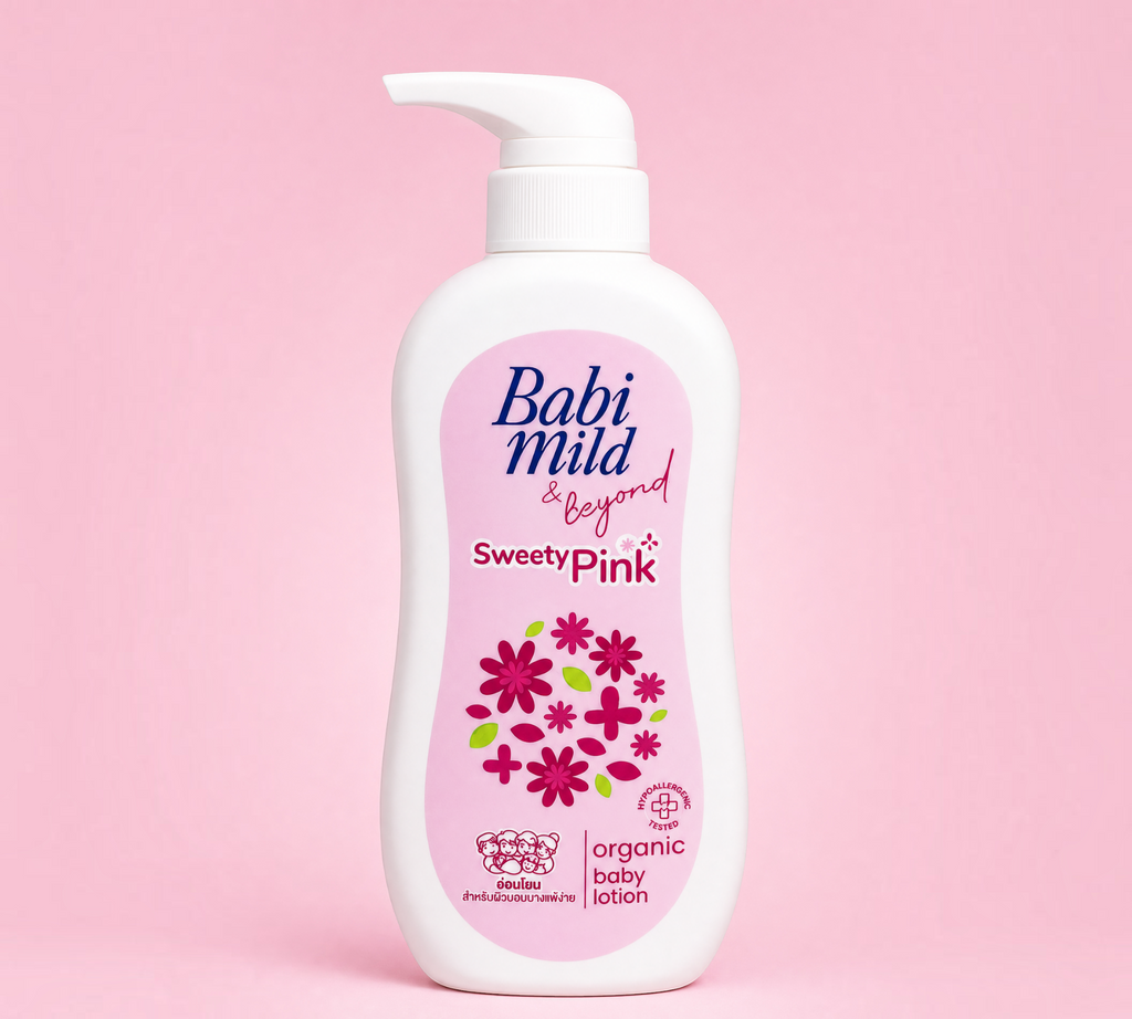 Thai Ranee Babi Mild & Beyond Sweety Pink organic baby lotion in a 350ml pump bottle against a soft pink background.