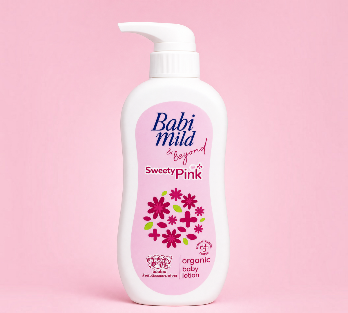 Thai Ranee Babi Mild & Beyond Sweety Pink organic baby lotion in a 350ml pump bottle against a soft pink background.