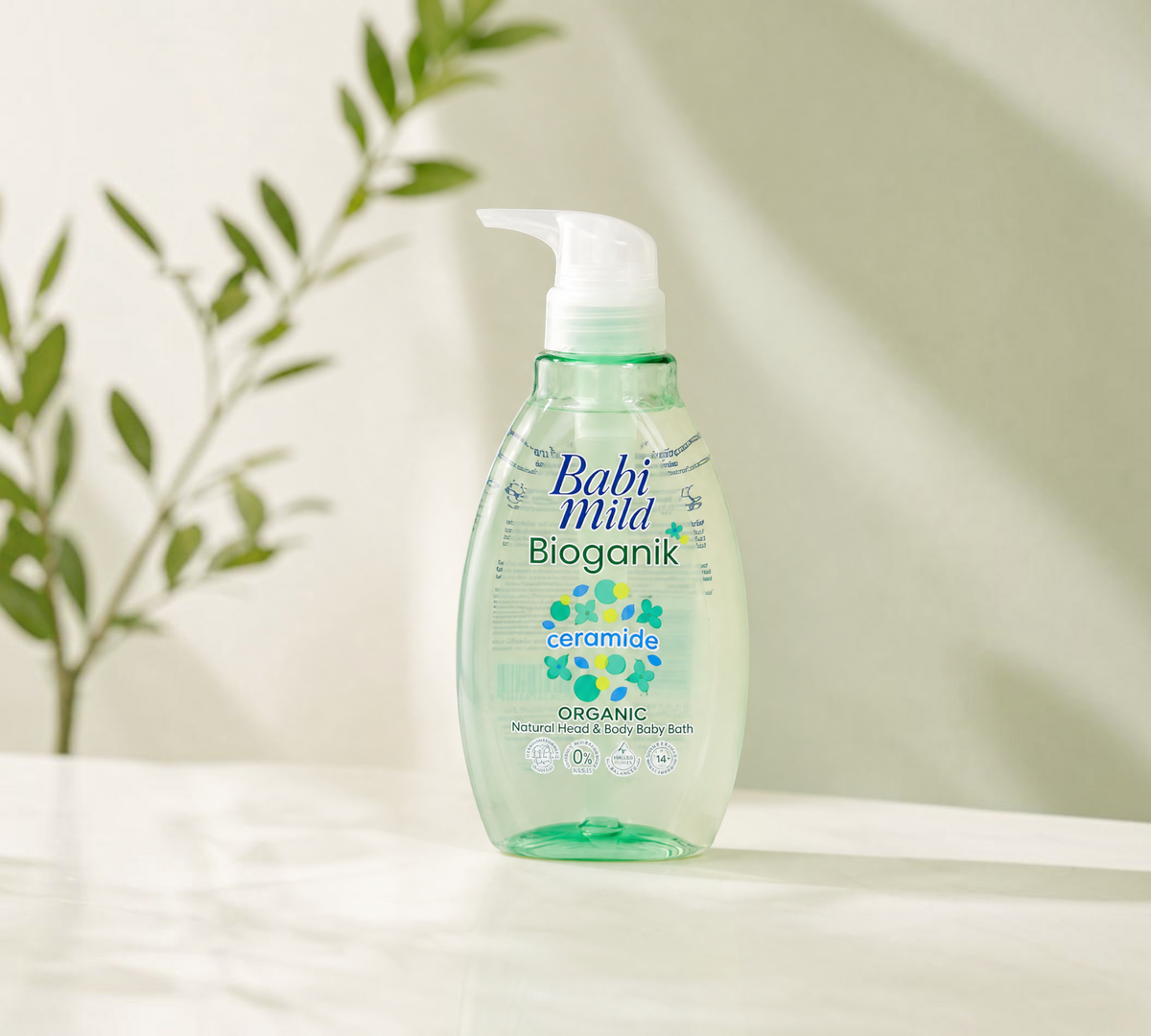 Thai Ranee Babi Mild Bioganik organic head and body baby bath in a clear green pump bottle with ceramide formula.