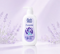 Thai Ranee Babi Mild Relaxing Lavender organic baby lotion in a 350ml pump bottle with purple lavender floral accents.