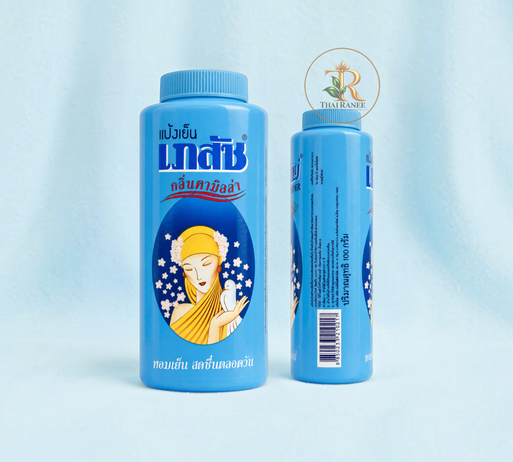 Thai Ranee Bhaesaj Cooling Powder in Camilla Aroma scent, featuring blue bottles with floral and dove illustrations.