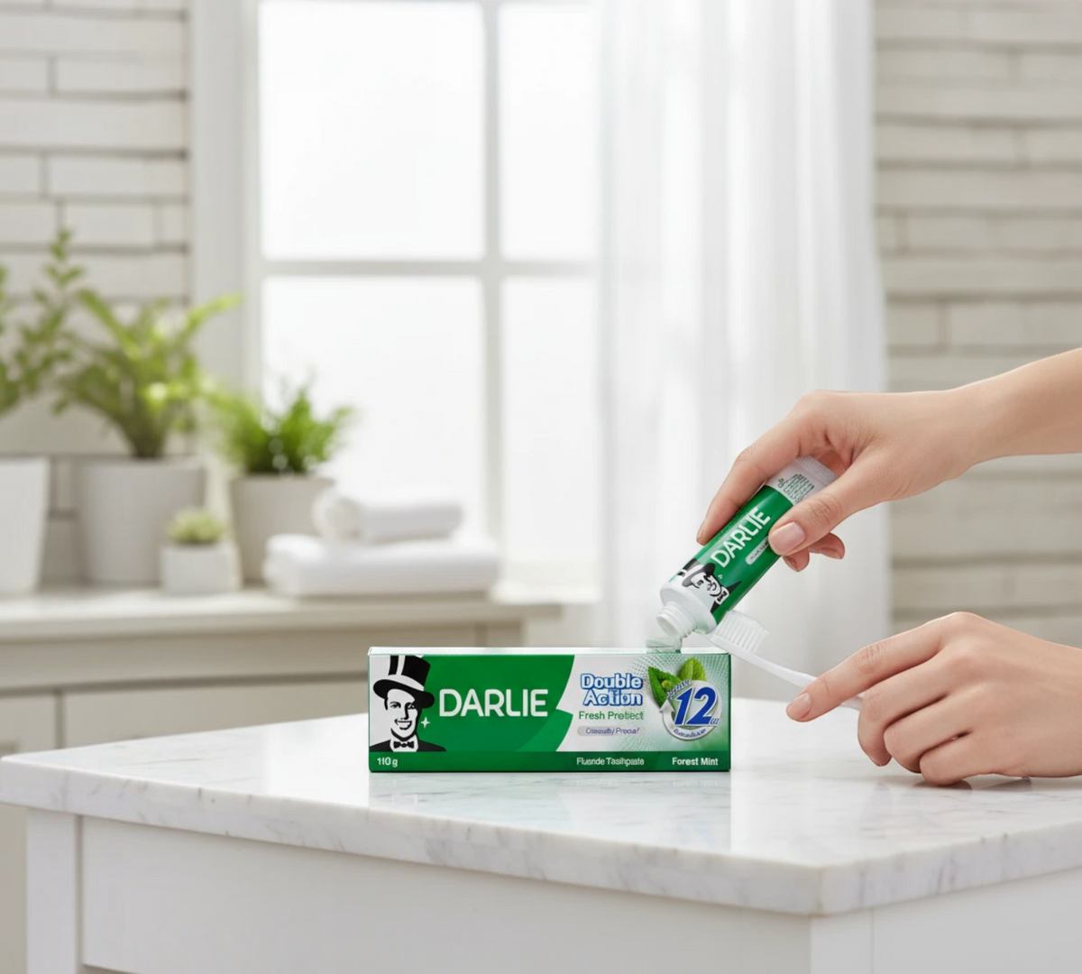 Thai Ranee Darlie Double Action Fresh Protect Forest Mint toothpaste being squeezed onto a toothbrush
