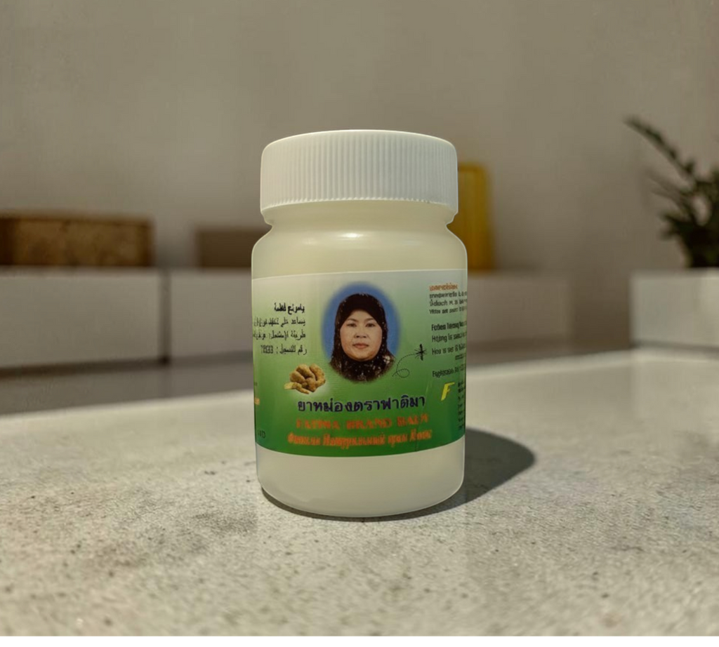Thai Ranee Fatima Brand natural herbal relief balm in a small white plastic jar for soothing muscle aches
