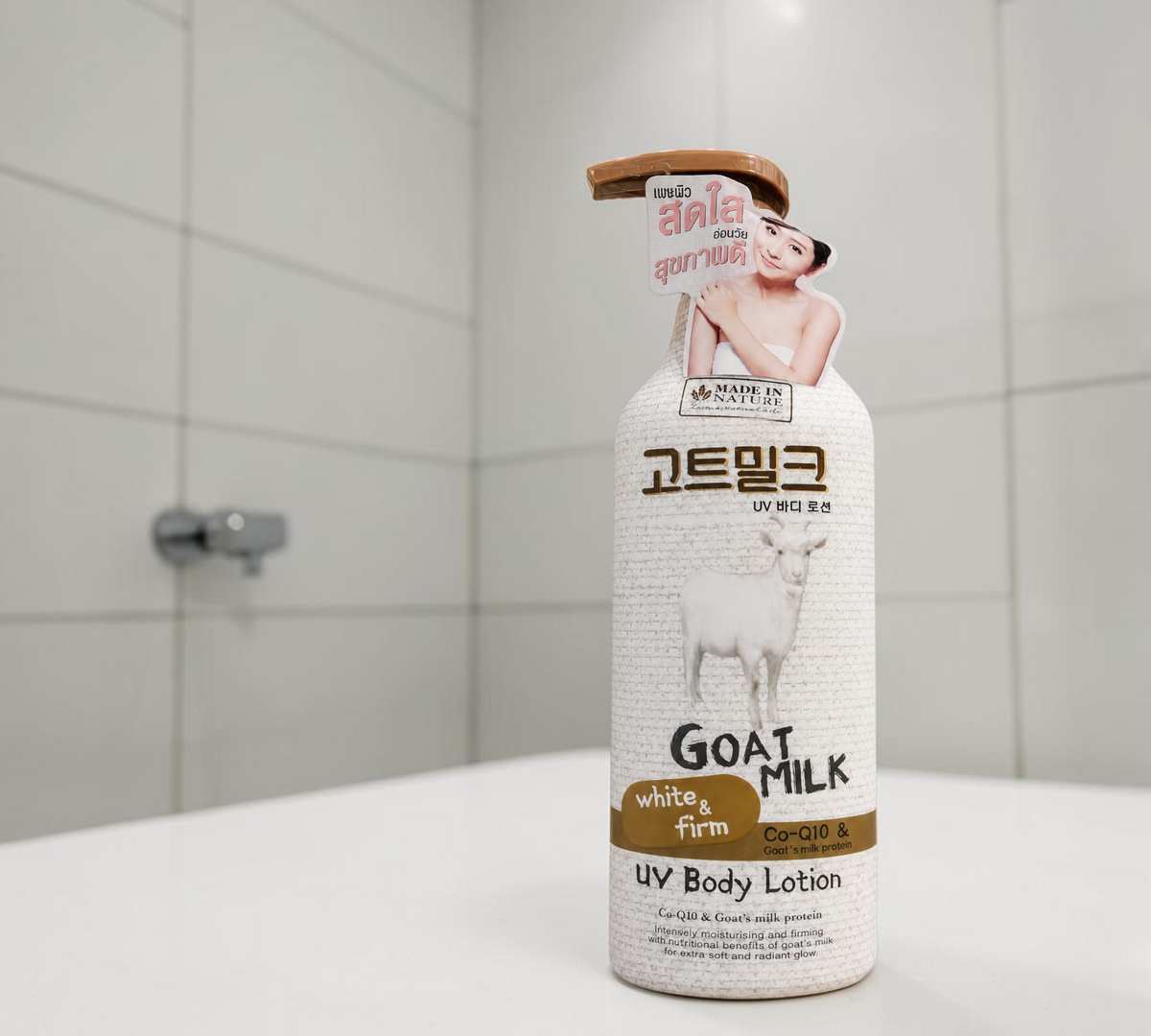 Thai Ranee Made in Nature Goat Milk White & Firm UV body lotion bottle with pump dispenser and goat illustration.