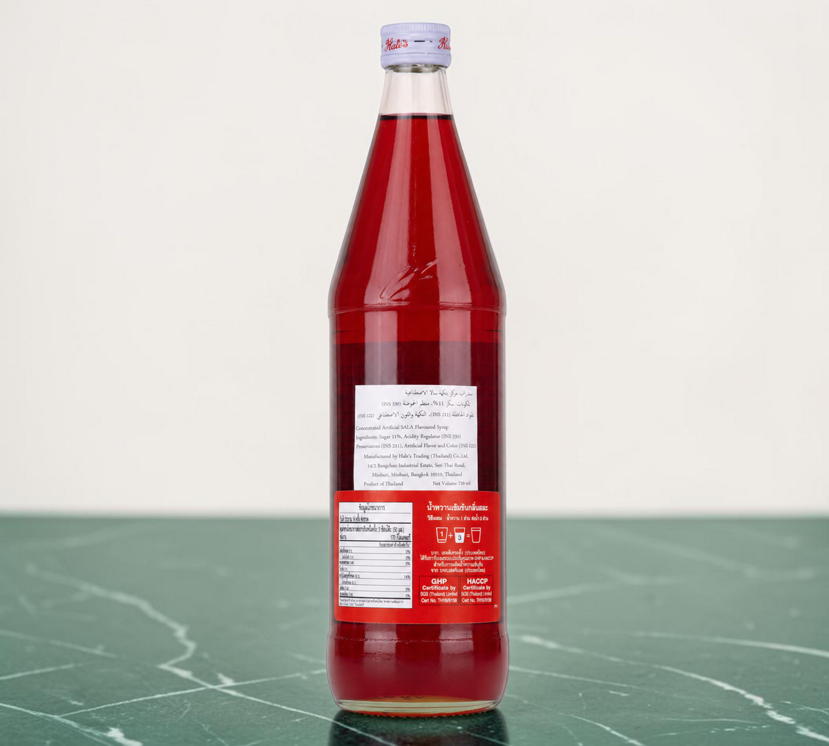Thai Ranee Hale's Blue Boy concentrated Sala flavoured syrup in a 710ml glass bottle with a vibrant red colour.