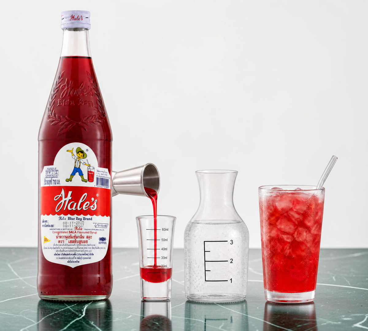 Thai Ranee Hale's Blue Boy concentrated sala flavoured syrup bottle with mixing instructions and a glass of sala soda.