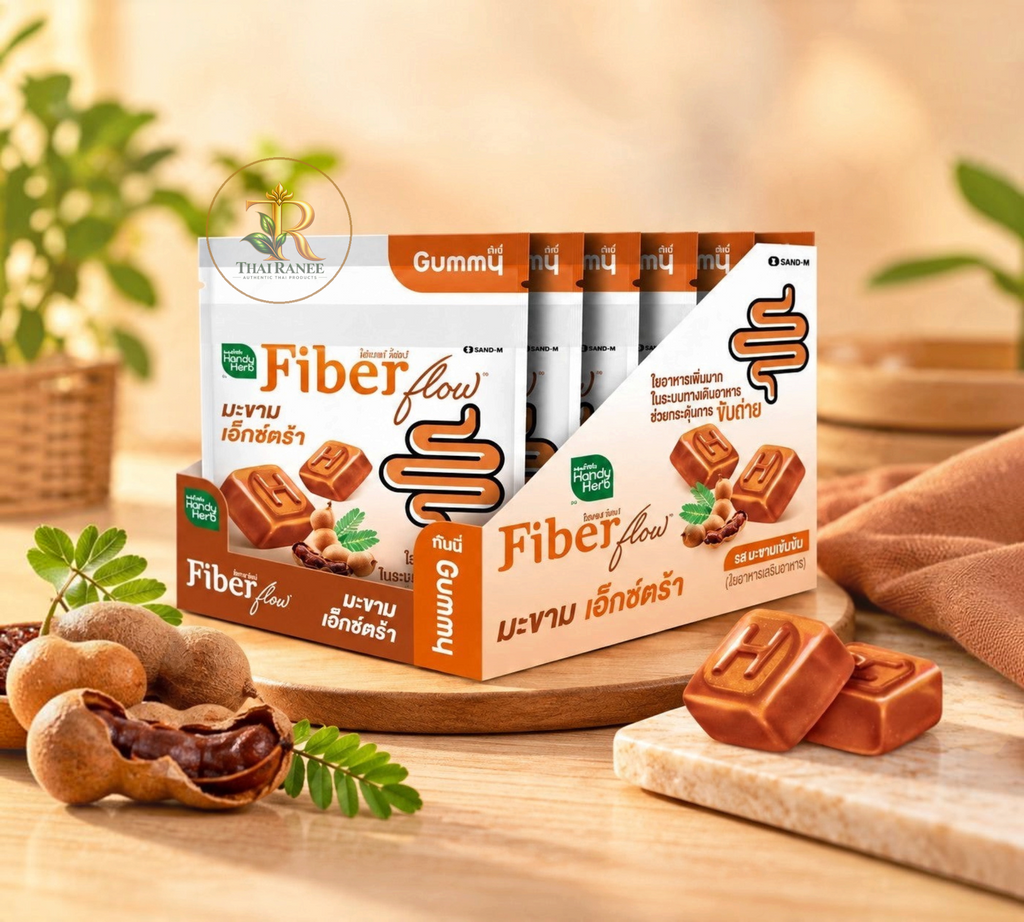 Thai Ranee HandyHerb Fiber Flow tamarind digestive supplement gummies in a display box with fresh tamarind pods.