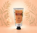 Thai Ranee Immortal Oriental Touch herbal rich hand and body lotion in a 50ml squeeze tube with floral packaging.