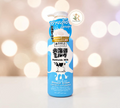 Thai Ranee Made in Nature Hokkaido Milk moisture-rich shower cream in a 700ml blue pump bottle with cow illustration.