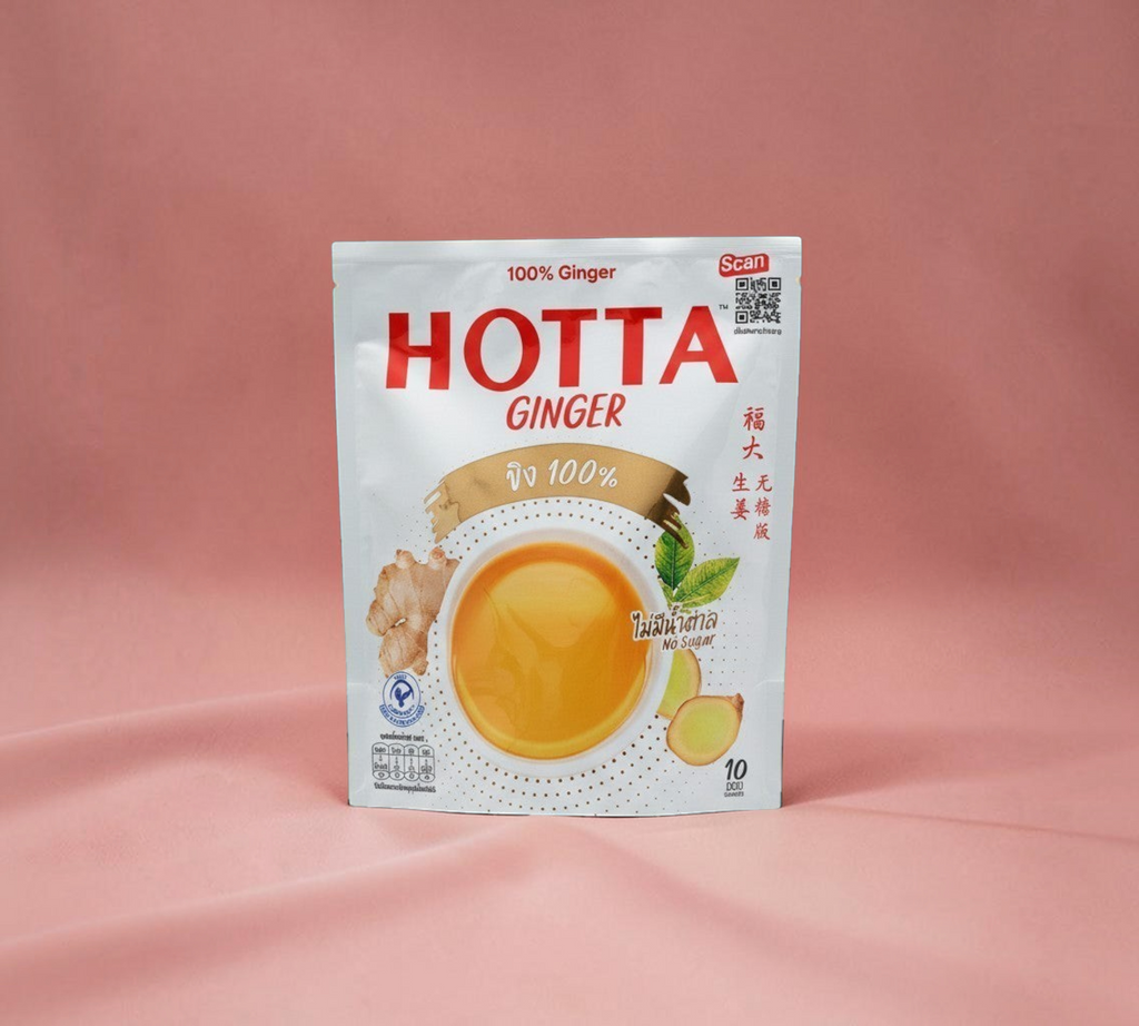 Thai Ranee HOTTA 100% instant ginger drink sachet, a sugar-free herbal infusion for wellness and digestion.