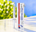 Thai Ranee Ble Skin PWP Hylu Collagen essence in a syringe applicator with its white and red product packaging box.