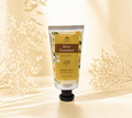 Thai Ranee Immortal Envy Enchanted herbal hand and body lotion in a 50ml travel-friendly tube with floral design