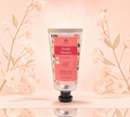 Thai Ranee Immortal Sweet Passion herbal hand and body lotion in a 50ml tube with floral packaging design