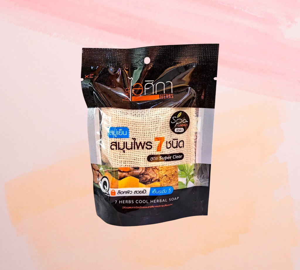 Thai Ranee Isika Herbs Seven Herbs Cool Herbal Soap in a black pouch with an included exfoliating mesh bag.