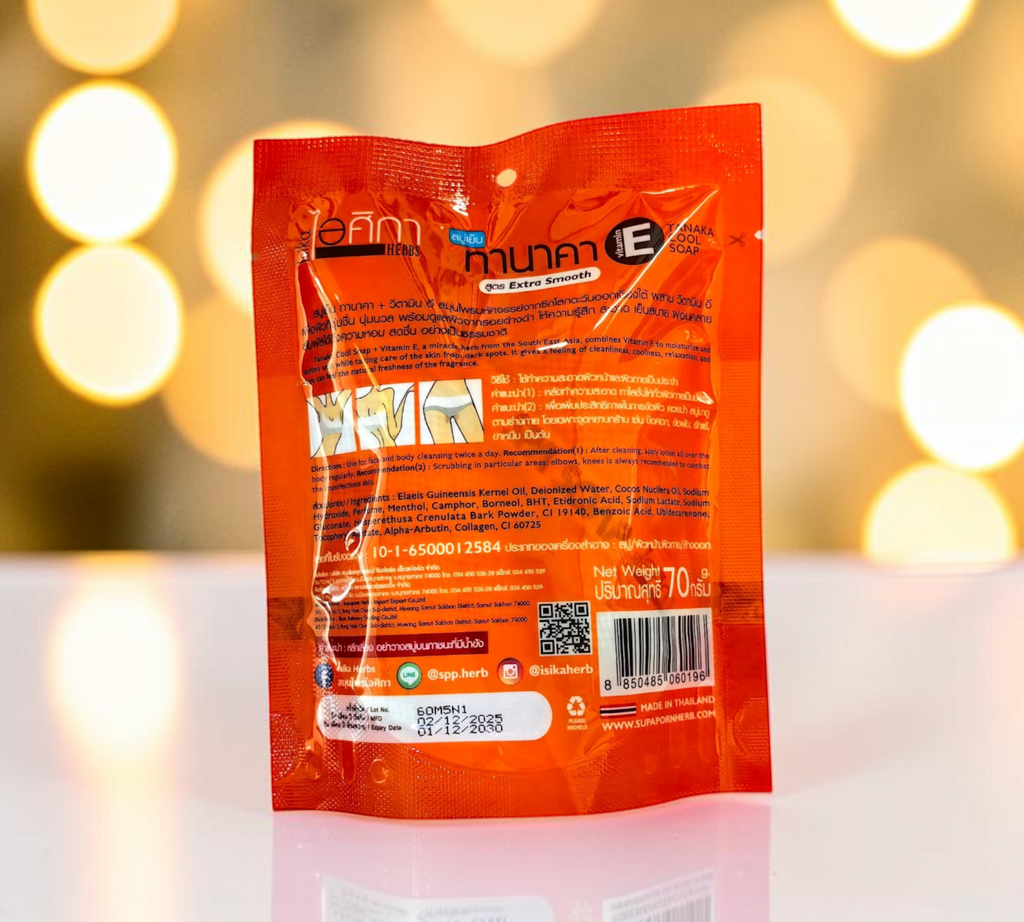 Thai Ranee Isika Tanaka Cool Soap with Vitamin E in orange packaging with herbal ingredients and exfoliating benefits.