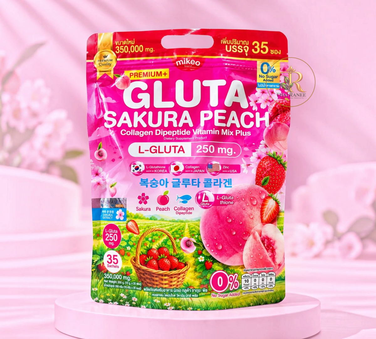 Thai Ranee Mikeo Gluta Sakura Peach collagen supplement powder pack with strawberry and peach fruit illustrations.