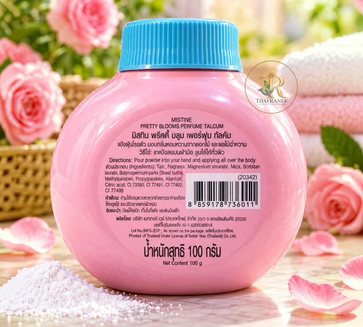 Thai Ranee Mistine Pretty Blooms Perfume Talcum powder in a round pink bottle with a blue cap, surrounded by roses.