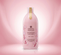 Thai Ranee Oriental Princess Lovely Sakura body lotion in a pink bottle with cherry blossom floral design.