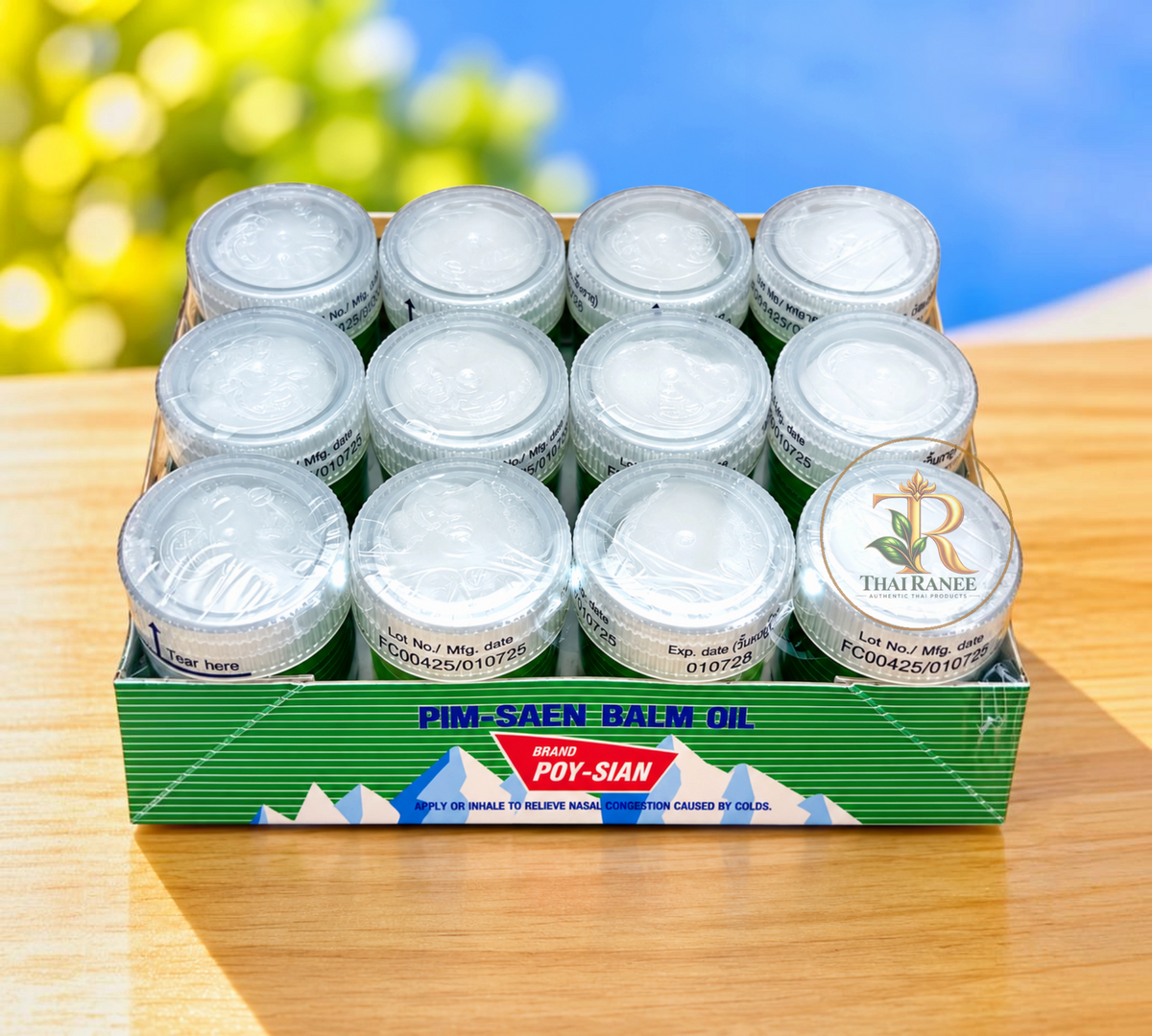 Thai Ranee Poy-Sian Pim-Saen balm oil nasal inhaler set in a green display box for nasal congestion relief.