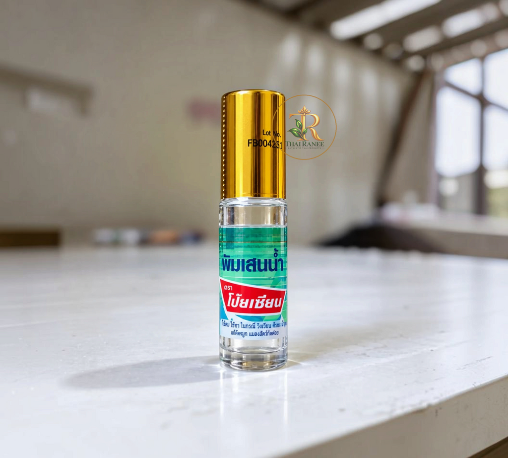 Thai Ranee Poy-Sian herbal liquid inhaler roll-on with a gold cap in a clear glass bottle for aromatherapy relief.