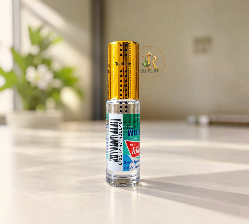 Thai Ranee Poy-Sian herbal liquid inhaler roll-on in a clear glass bottle with a gold cap on a white surface.