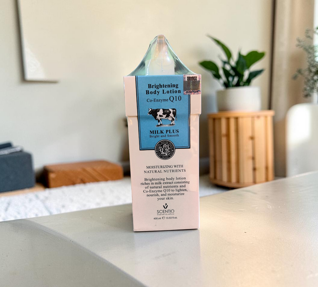 Thai Ranee Scentio Milk Plus Brightening Body Lotion with Co-Enzyme Q10 in a 400ml milk carton style bottle.