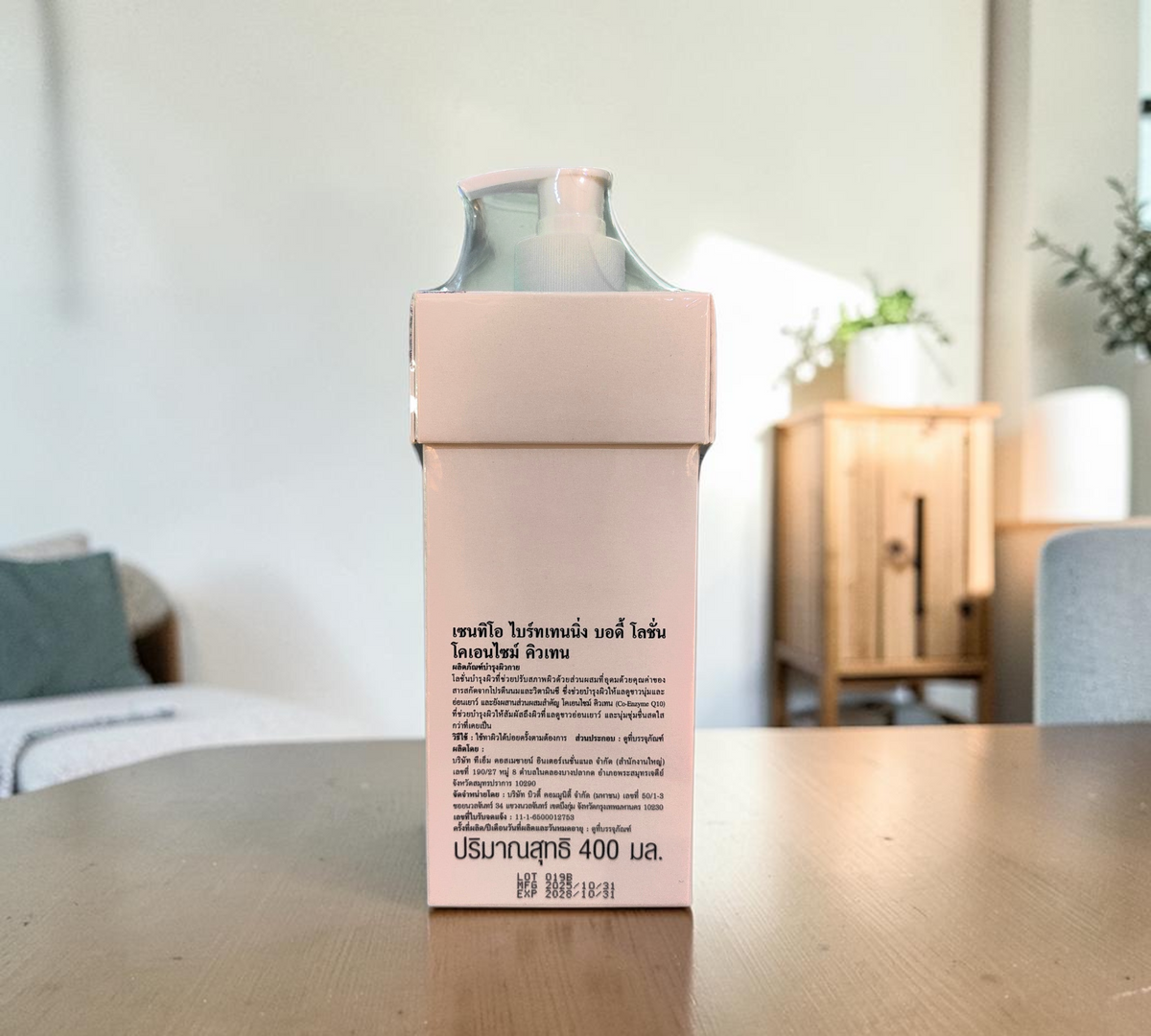 Thai Ranee Scentio Milk Plus Brightening Body Lotion in a 400ml white pump bottle with Thai text label