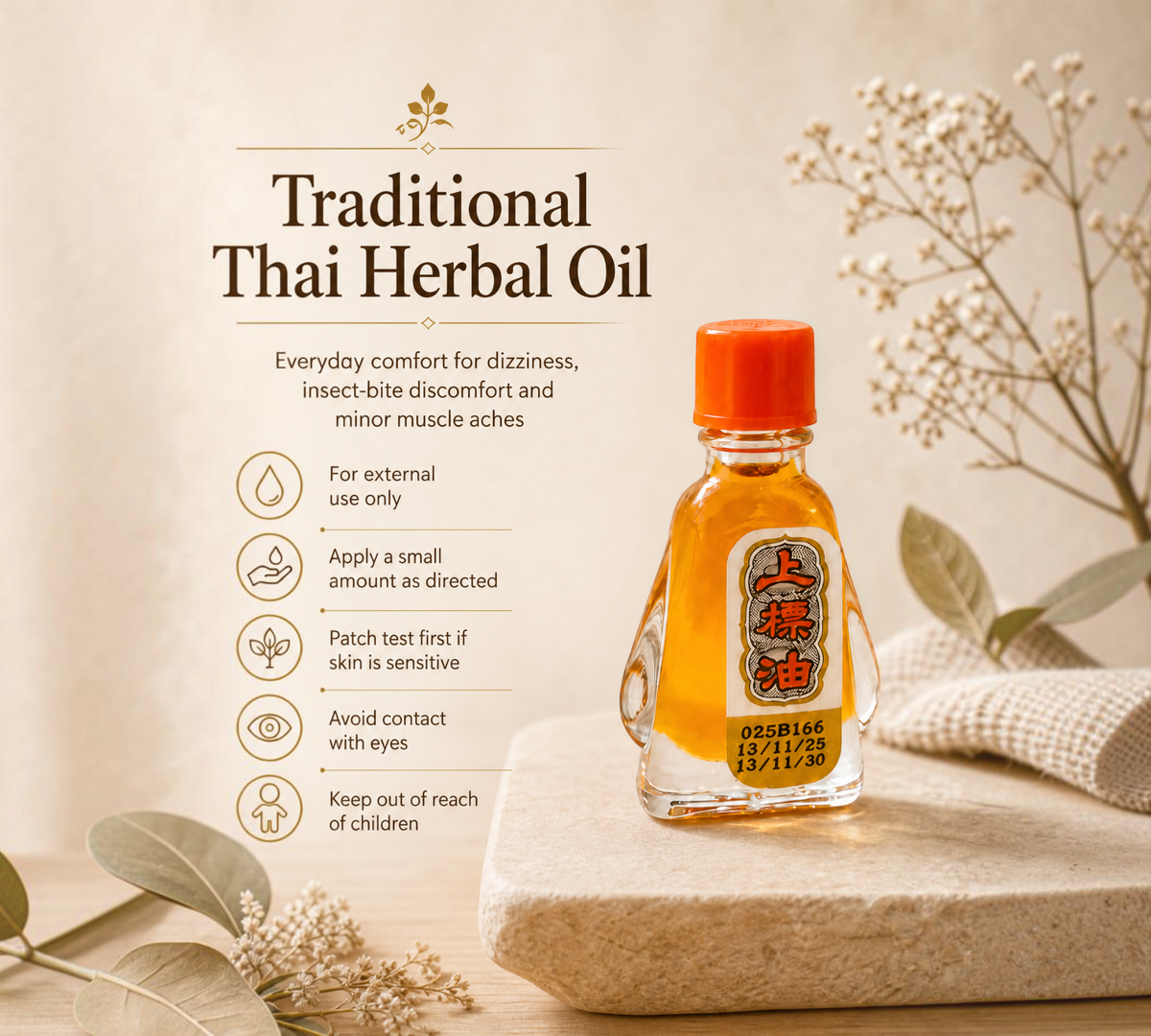 Thai Ranee Siang Pure Oil Formula I herbal oil in a small glass bottle with an orange cap on a stone surface.
