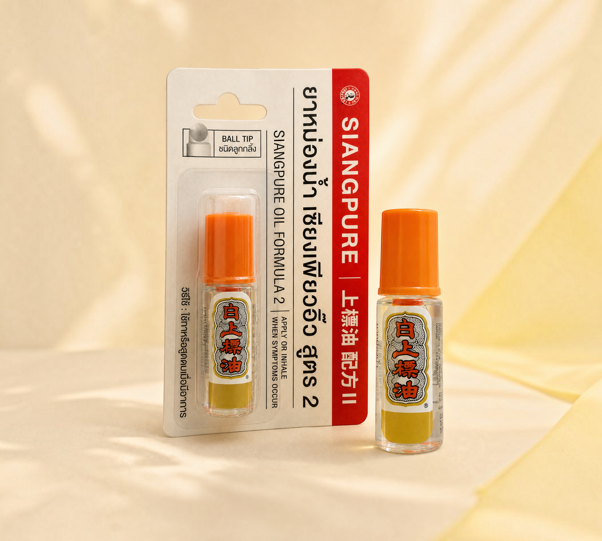 Thai Ranee Siangpure Oil Formula 2 herbal roll-on with ball-tip applicator in cream and red packaging