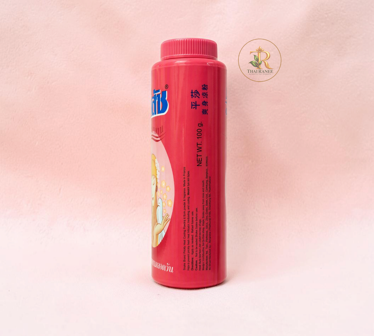 Thai Ranee Snake Brand Prickly Heat cooling body powder in a pink 100g bottle for soothing skin irritation.