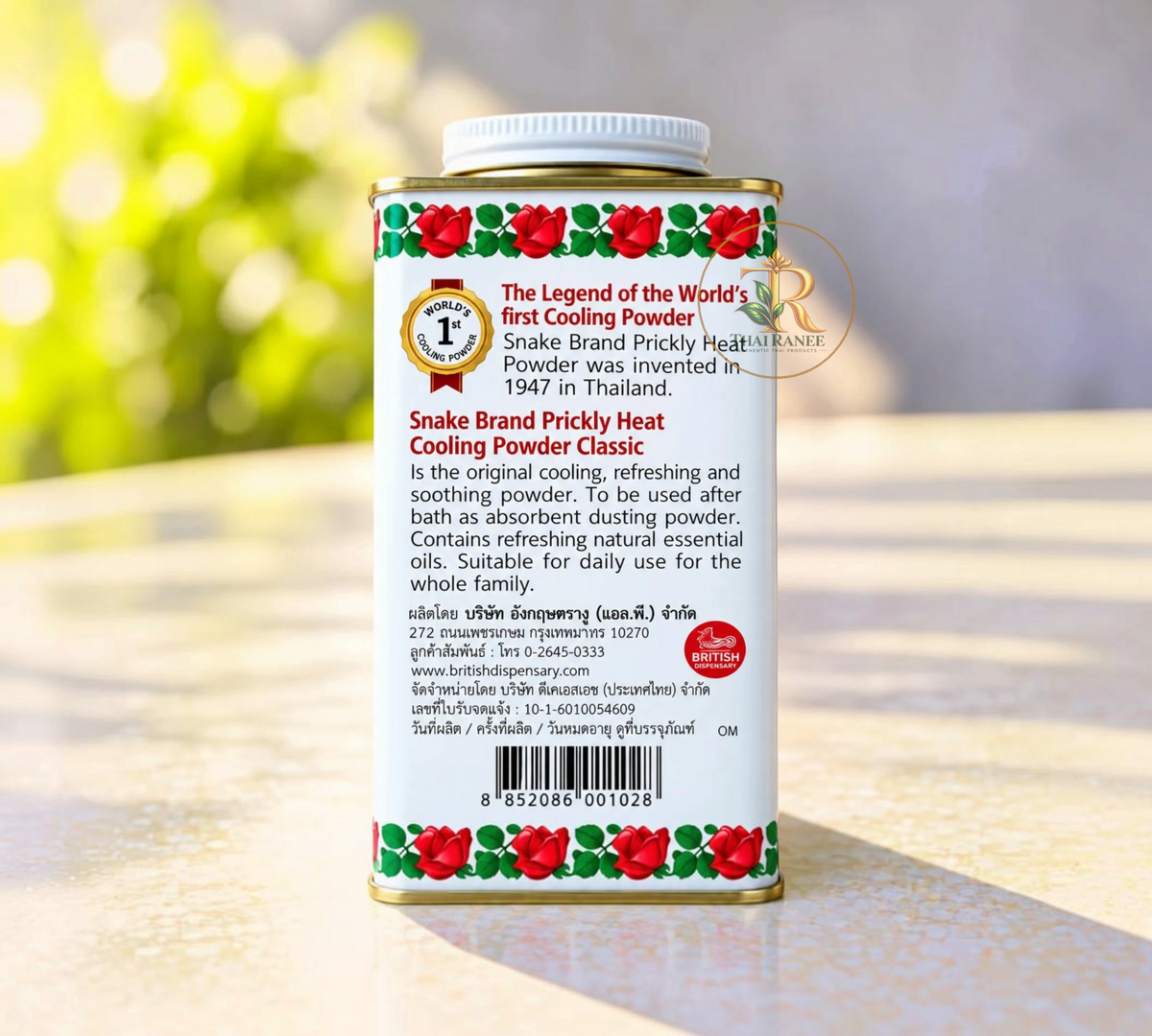 Thai Ranee Snake Brand Prickly Heat Original cooling powder metal tin with red rose pattern and product information.