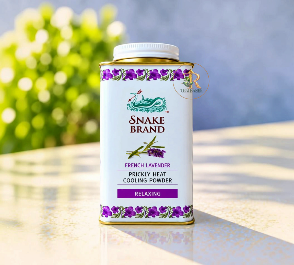 Thai Ranee Snake Brand French Lavender cooling powder in a white metal canister with purple floral accents