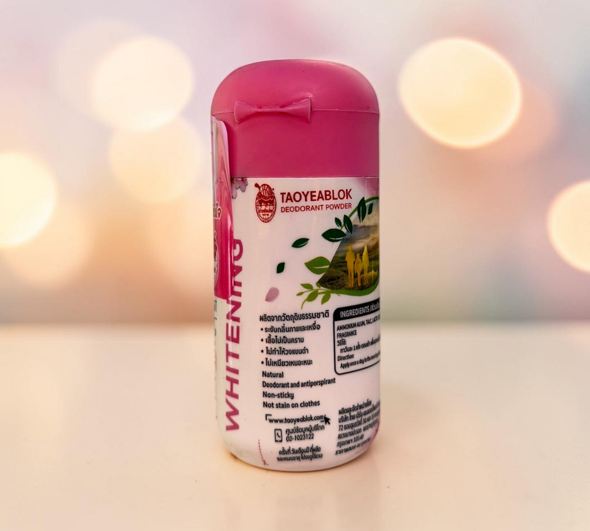 Thai Ranee TAOYEABLOK whitening deodorant powder in a white bottle with a pink cap and Sakura scent branding