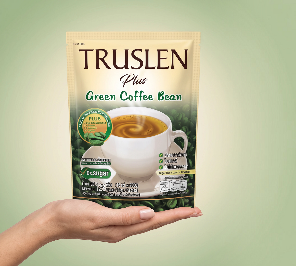 Thai Ranee TRUSLEN Plus Green Coffee Bean instant beverage mix sachet held in a hand, sugar-free coffee blend.